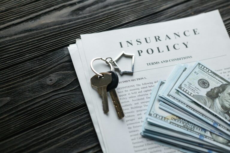 Home Insurance Policy With Keys And Dollar Money Mortgage, Loan Or Home Insurance Documents